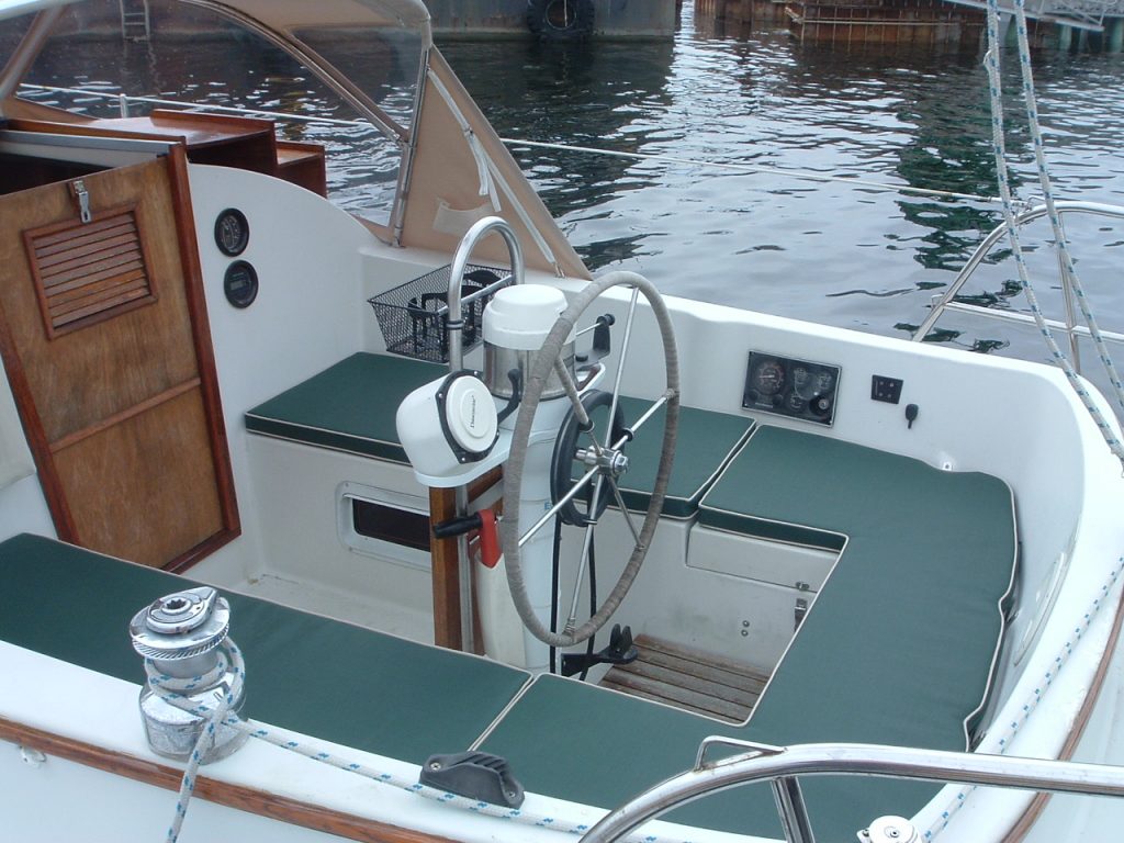 Green cockpit benches on sailboat
